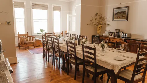 The farmhouse dining room prepared for guests