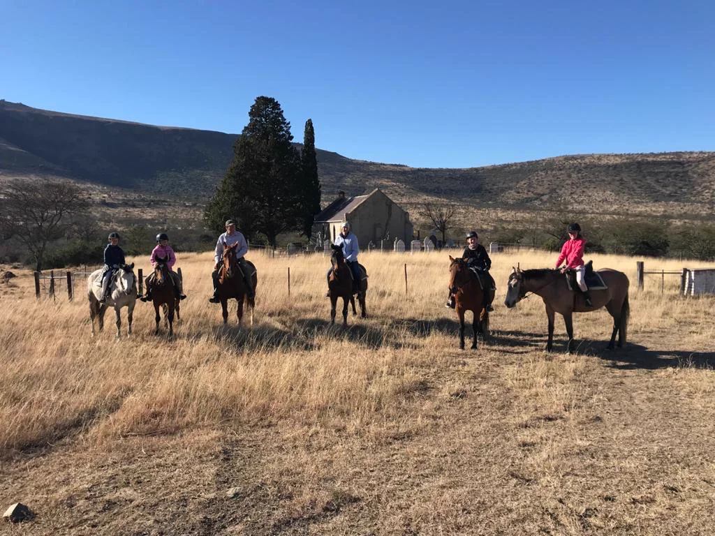 The Morgan family riding together in the Mankazana Valley