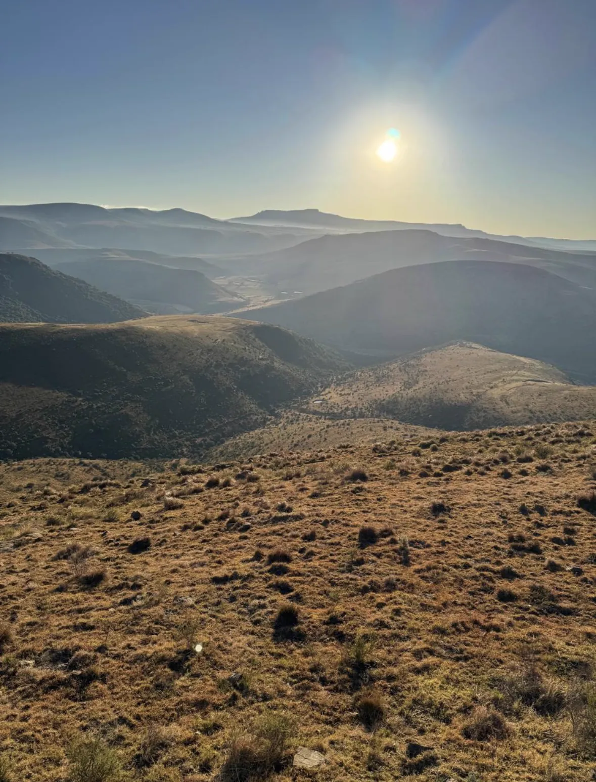 Mountain ridges beneath the sun in the Mankazana Valley